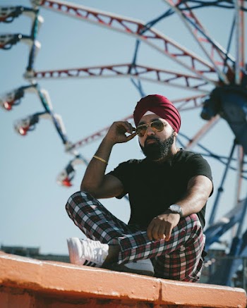 Photo Of Man Sitting On Ground 