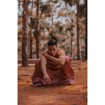 Photo Of Man Sitting On Ground