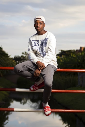 Photo Of Man Sitting On Handrail