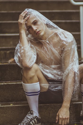 Photo of Man Sitting on Staircase