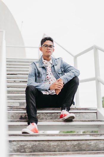 Photo of Man Sitting on Stairs