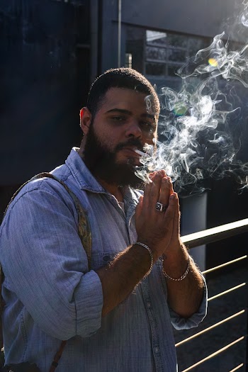 Photo of Man Smoking Cigarette