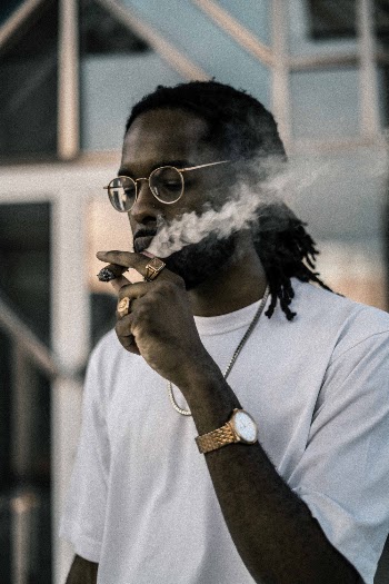 Photo Of Man Smoking Cigars