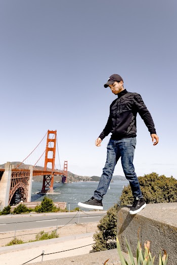 Photo Of Man Standing Concrete Surface