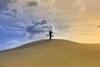 Photo Of Man Standing In The Dessert