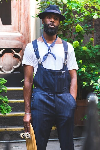 Photo of Man Standing Near Plants