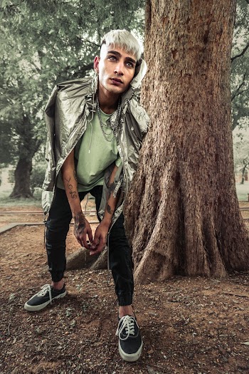 Photo of Man Standing Near Tree