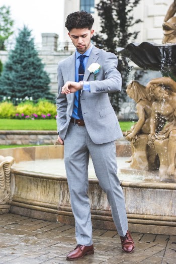 Photo of Man Standing Near Water Fountain