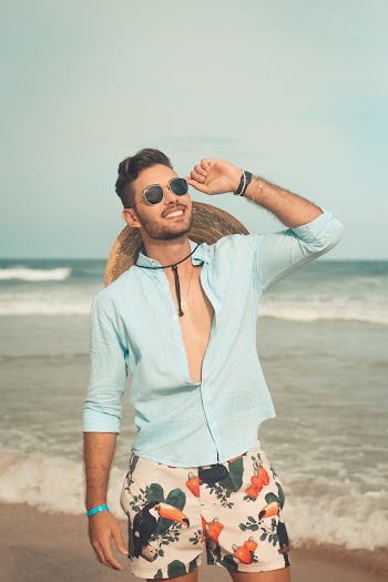 Photo of Man Standing on Beach