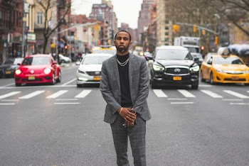 Photo of Man Standing on Road