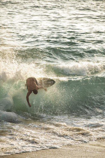 Photo of Man Surfboarding
