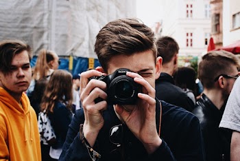 Photo of Man Taking Picture