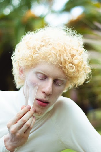 Photo of Man Touching His Chin