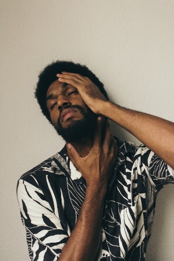 Photo of Man Touching His Face