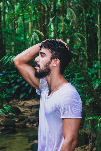 Photo Of Man Touching His Head