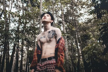 Photo Of Man Under The Trees During Daytime