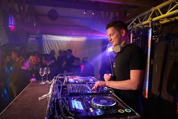 Photo of Man Using Dj Mixer