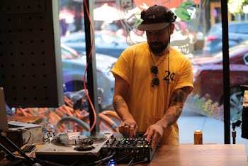 Photo of Man Using Mixing Panel