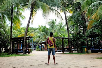 Photo of Man Wearing Bag
