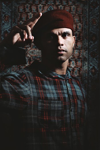 Photo of Man Wearing Beret