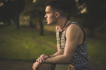 Photo of Man Wearing Black And White Tank Top