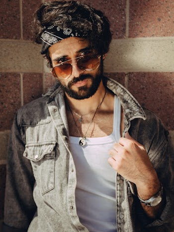Photo Of Man Wearing Black Bandana