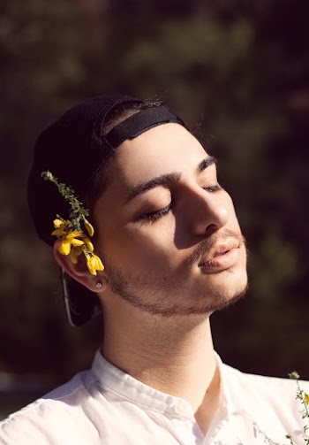Photo of Man Wearing Black Cap