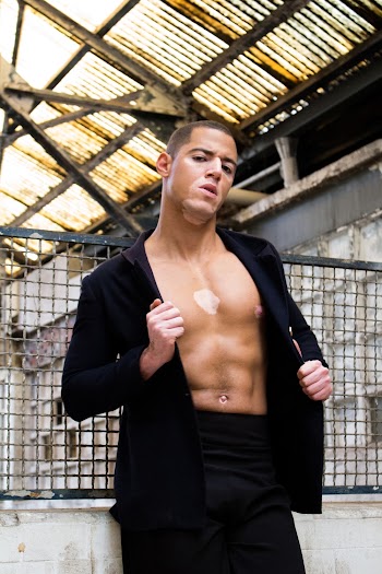 Photo Of Man Wearing Black Coat