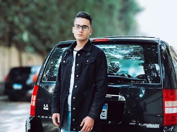 Photo of Man Wearing Black Denim Jacket