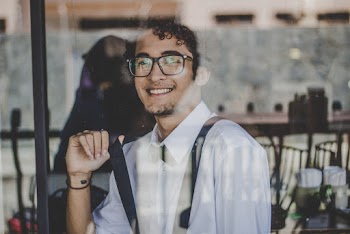 Photo Of Man Wearing Black Eyeglasses