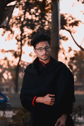 Photo Of Man Wearing Black Eyeglasses