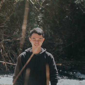 Photo of Man Wearing Black Hoodie
