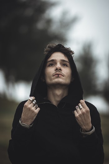 Photo Of Man Wearing Black Hoodie