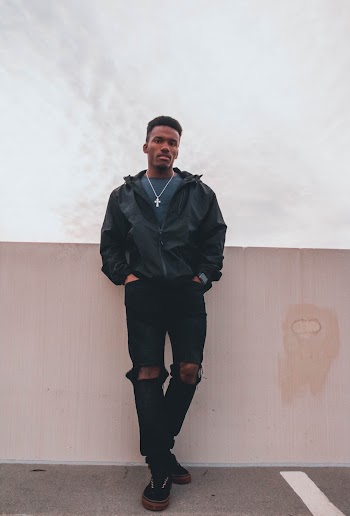 Photo Of Man Wearing Black Jacket