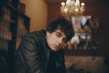 Photo of Man Wearing Black Leather Jacket