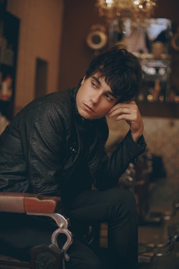 Photo of Man Wearing Black Leather Jacket