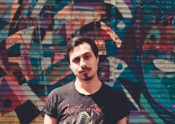 Photo Of Man Wearing Black Printed Shirt