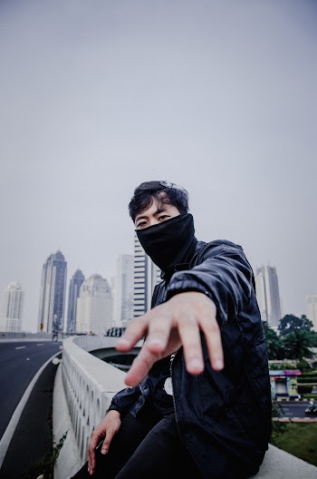 Photo of Man Wearing Black Scarf