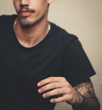 Photo Of Man Wearing Black Shirt