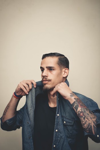 Photo Of Man Wearing Black Shirt
