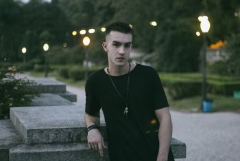 Photo of Man Wearing Black Shirt
