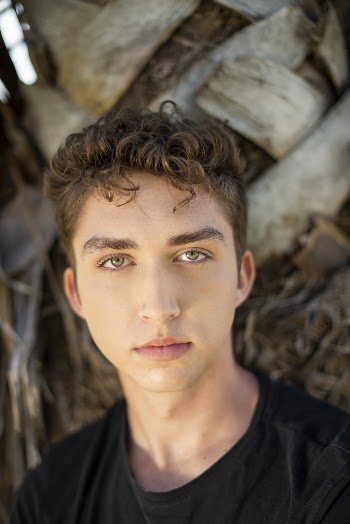 Photo Of Man Wearing Black Shirt