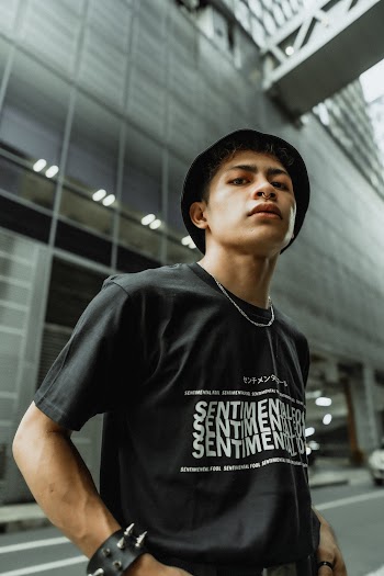 Photo Of Man Wearing Black Shirt