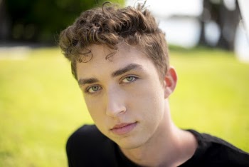 Photo Of Man Wearing Black Shirt