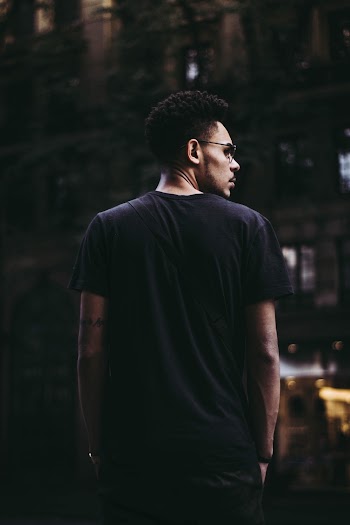 Photo of Man Wearing Black Shirt