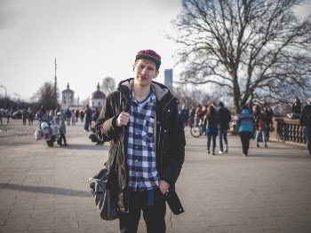 Photo of Man Wearing Black Zip-up Jacket