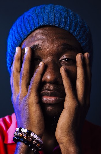 Photo Of Man Wearing Blue Bonnet