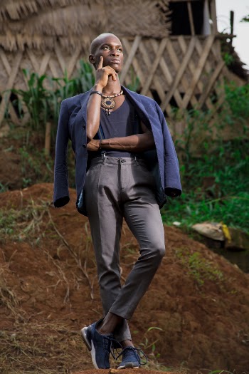 Photo Of Man Wearing Blue Coat