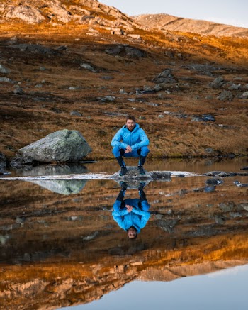 Photo of Man Wearing Blue Jacket