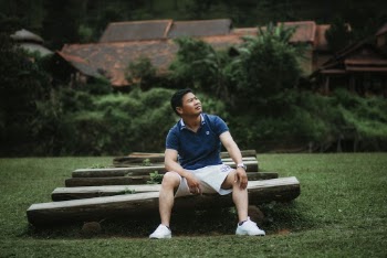 Photo Of Man Wearing Blue Polo Shirt